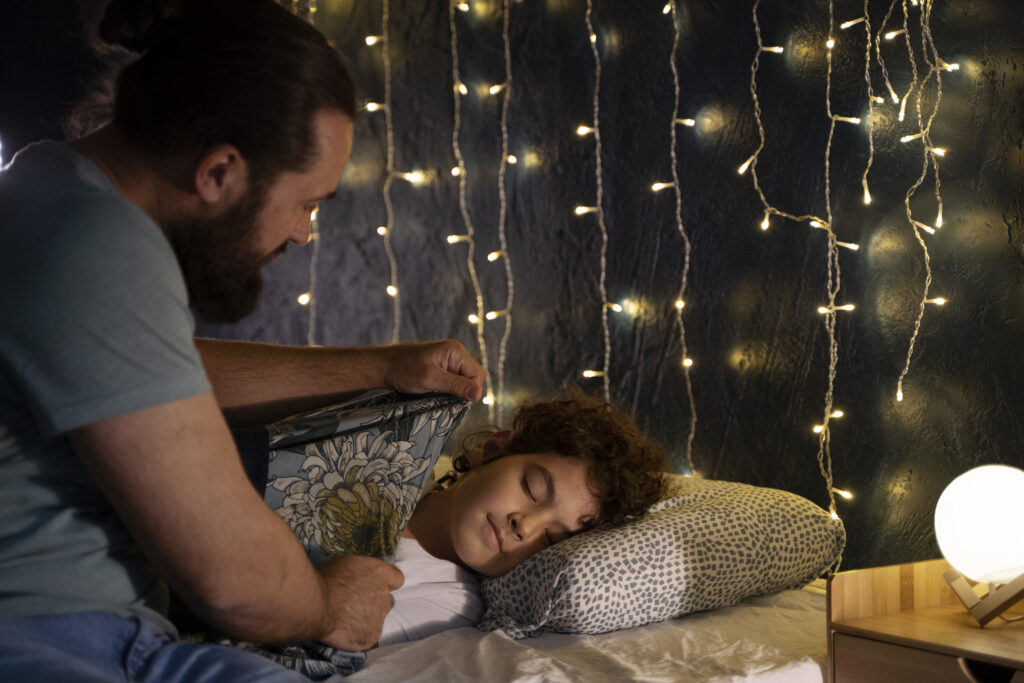 Couple putting their kids to sleep