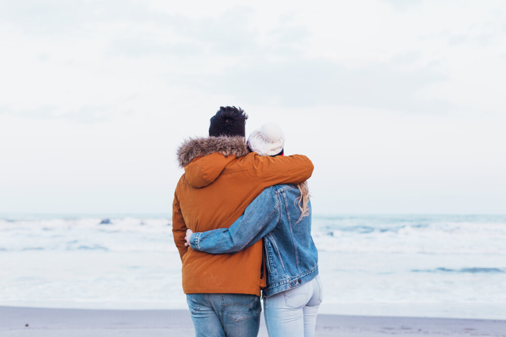 Strong couple hugging