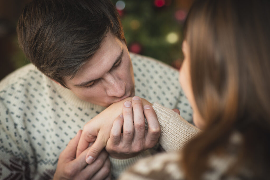 Husband kissing his wife's hand