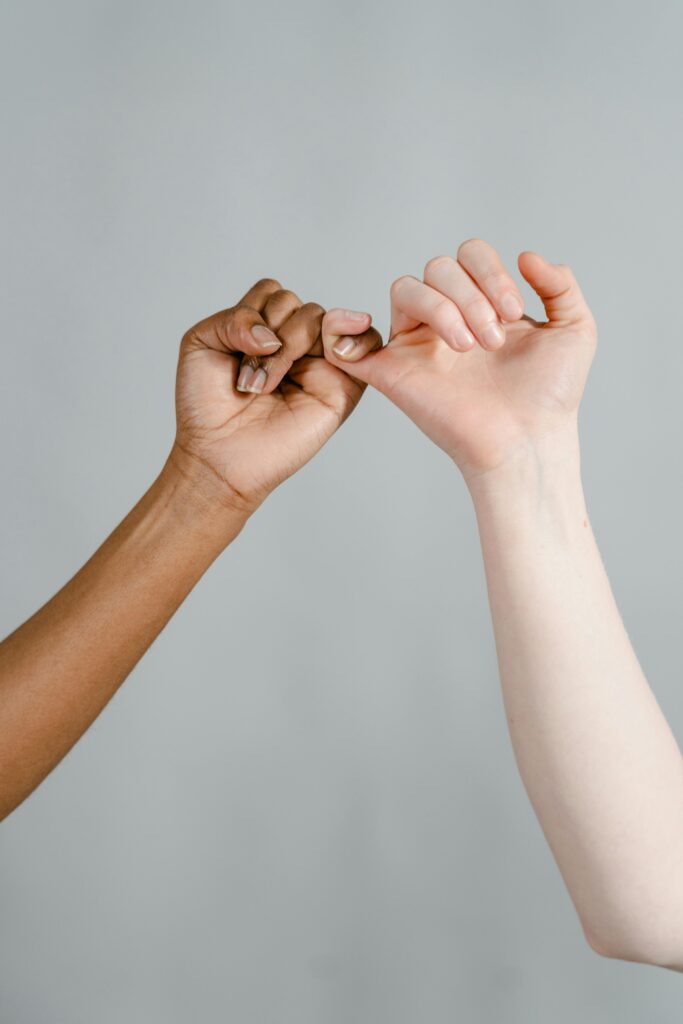 Hands holding each other